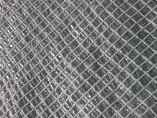 Surface Film Renforcé Polyéthylène Avec Des Reflets Solaires Différentes Formes — Photo
