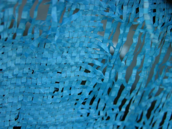 Old Decrepit Blue Tarpaulin Weave Residual Individual Fragments Tarpaulin Close — Stock Photo, Image