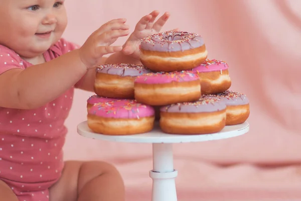 Stack Tasty Glazed Donuts Stand Baby Girl Closeup Focus Hands — Stock Photo, Image