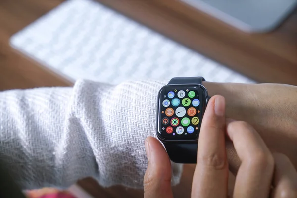 stock image Bali Indonesia June 12, 2020 : female hands using with apple, Apple Watch is a line of smartwatches designed, developed, and marketed by Apple Inc.