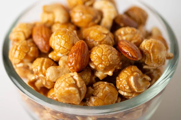 Caramel Popcorn Cashew Nuts Almonds White Background Selective Focus — Stock Photo, Image