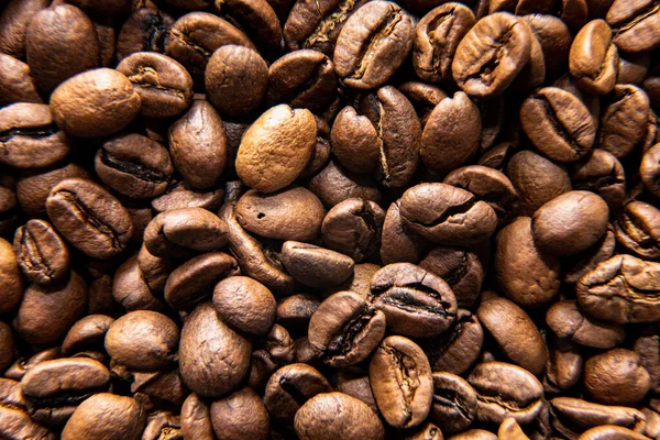 Many Coffee Beans Lies Together Table — Stock Photo, Image