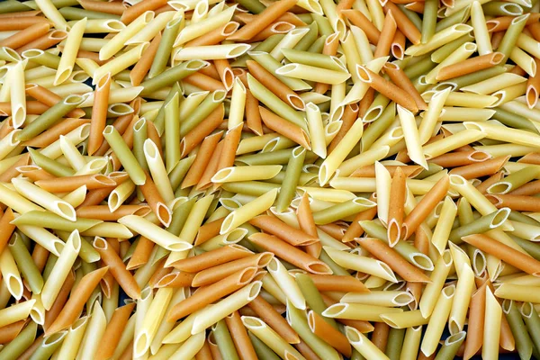 Penne Colorido Massas Close Fundo — Fotografia de Stock