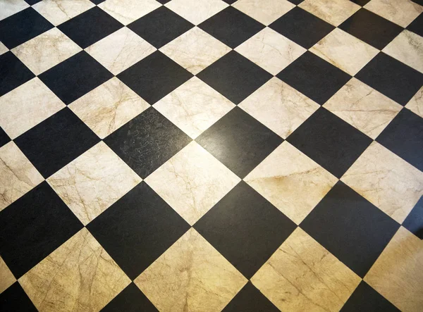 The ceramic floor is tiled in a checkerboard pattern — Stock Photo, Image