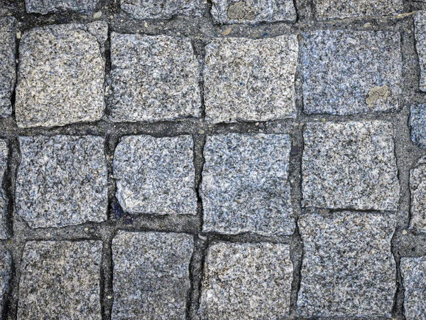 Az útburkoló kövek bélelt szürke kő megrendelt sorok — Stock Fotó