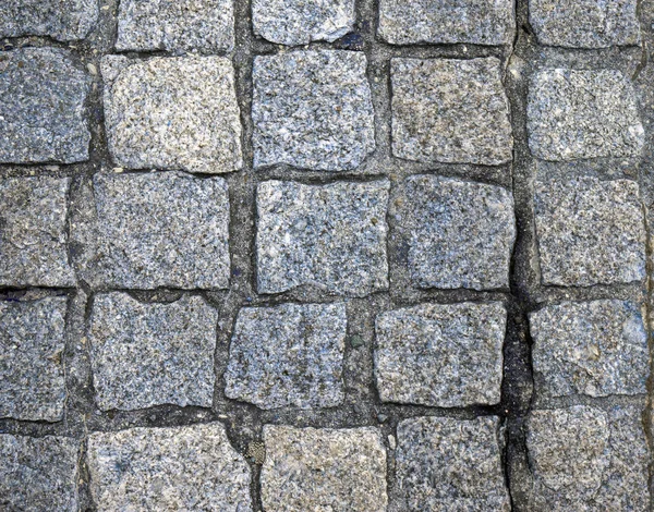 Stone pavers are lined with stones of the same size and shape — Stock Photo, Image