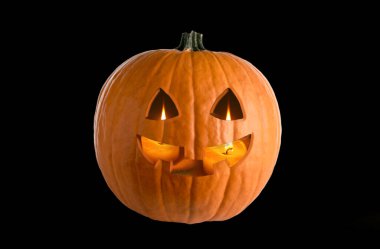 Cadılar Bayramı Jack O 'Lantern, siyah arkaplanda soyut grafiklerle portakal kabağı