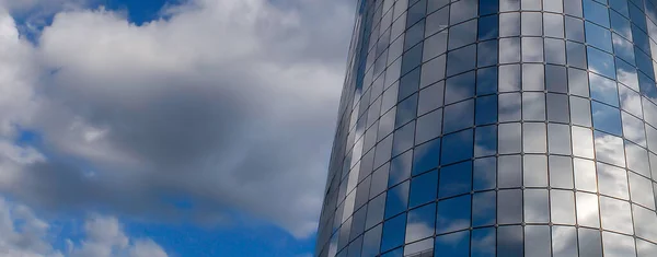 Mirror Facade Commercial Office Building Reflects White Clouds Blue Sky Stock Picture