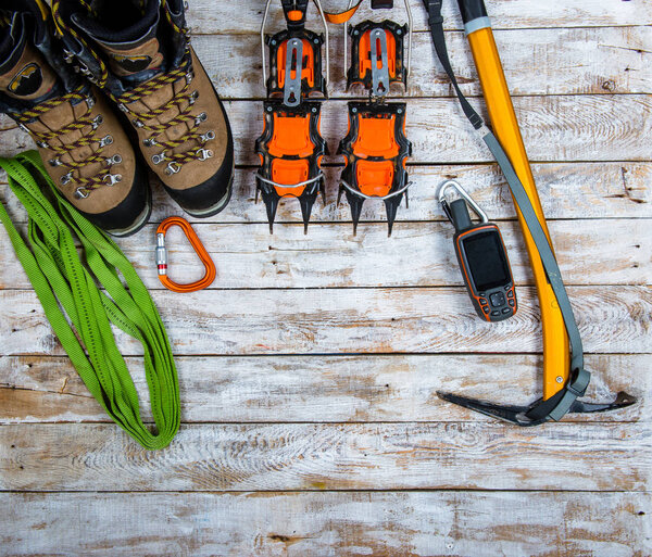 climbing equipment on a wooden background