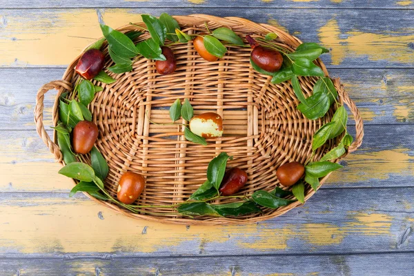 Chinese date fruits-Ziziphus jujuba fruits on wicker basket