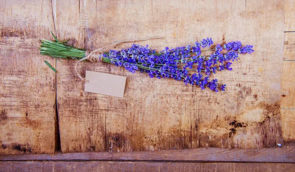 Lavender flowers, bouquet on rustic background, overhead