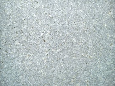 beyaz ve kahverengi çizgiler ve çizikler ile gri taş