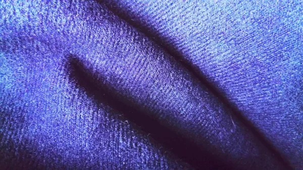 Kadife ya da kadife gibi görünen koyu mavi kumaş. Kırık mavi dalgalar