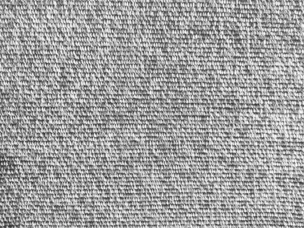 Woven coarse cotton fabric. Close-up. Black and white photography. Weaving thick threads. Smooth neat texture for the background.