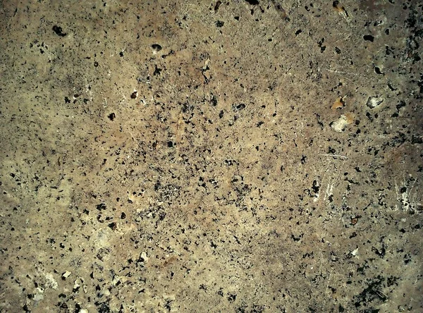 灰米色背景 有深色水花的石头的特写纹理 黑暗的磨擦纹理和表面 — 图库照片
