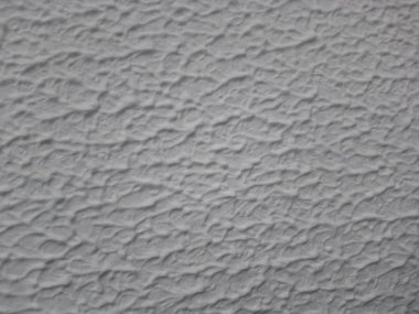 Duvarda kağıt duvar kağıdından yapılmış gri arka plan