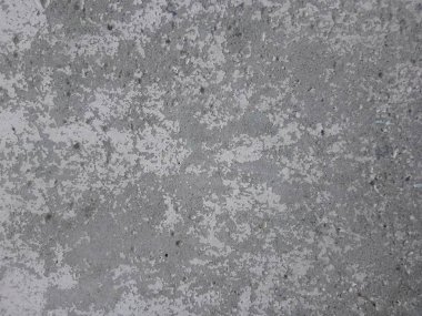 Eski beton duvardan yapılmış gri ve beyaz arka plan.