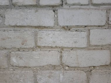 Eski tuğladan yapılmış gri ve beyaz arka plan