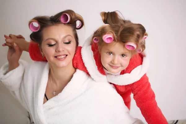 Emotions. Happy loving family. Mother and daughter spend time together at home.