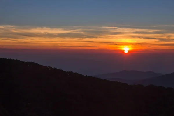 Landscape of sunrise over misty mountains in the morning at Chia — Stock Photo, Image