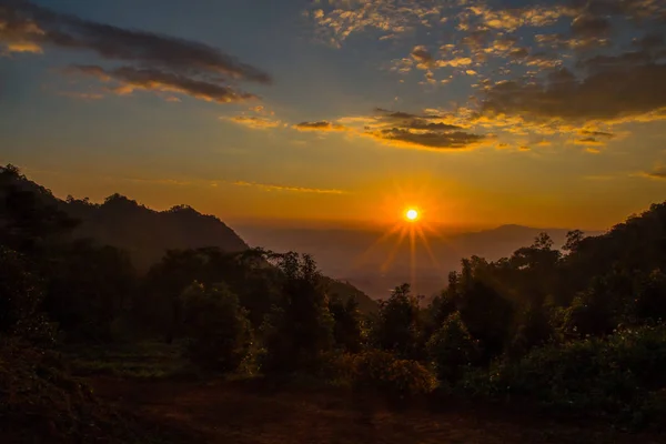 Landscape of sunrise over misty mountains in the morning at Chia — Stock Photo, Image