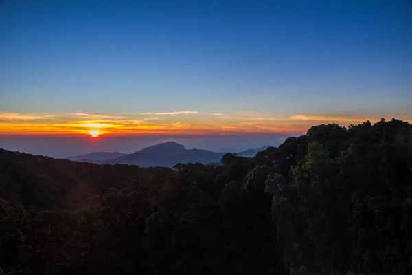 Landscape of sunrise over misty mountains in the morning at Chia — Stock Photo, Image