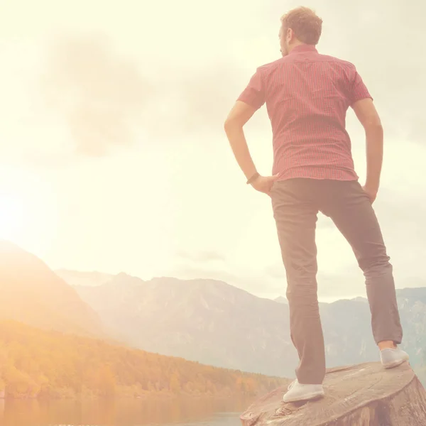 Loneliness concept. Man standing with back and looking forward