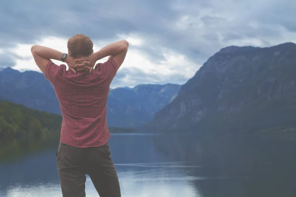 Loneliness concept. Man standing with back and looking forward