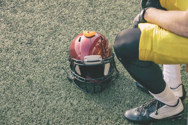 American football player waiting to join the game.