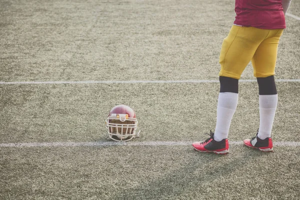 American football player waiting to join the game.