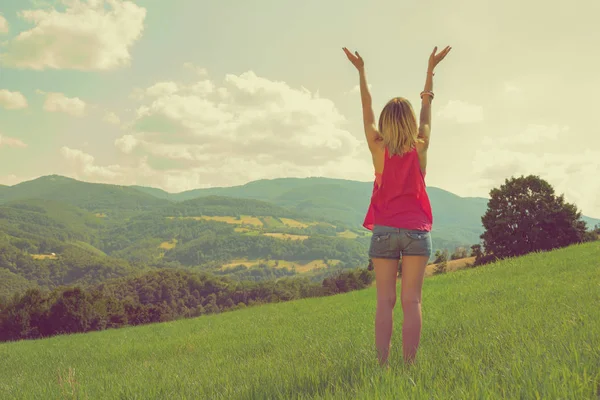 Back View Woman Raised Hands Green Lawn Sunny Day — Stock Photo, Image