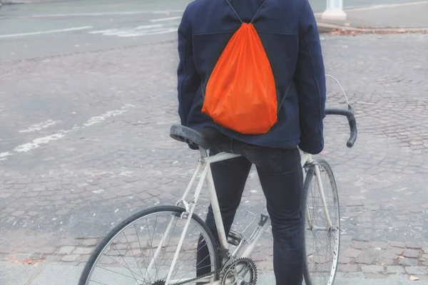 Urban cyclist at the street. Partly view