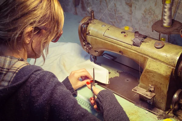 Close up shot of working tailor