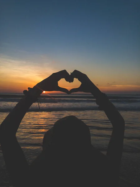 Girl Making Heart Shape Sign Hands Sea Ocean Sunset — Stock Photo, Image
