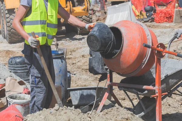 Construction Worker Cement Concrete Mixer Doing Hard Job — Stock Photo, Image