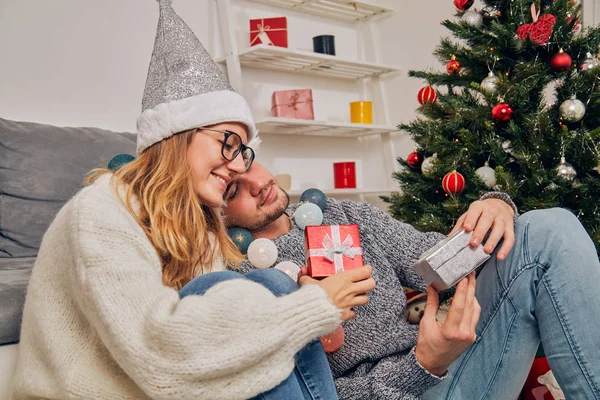 Happy couple enjoying New Year\'s / Christmas eve.