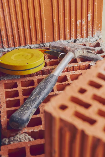 Construction tool on a brick. — Stock Photo, Image