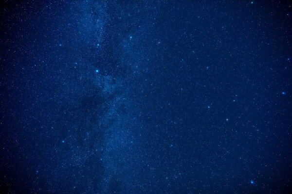 Milky way stars and constellations with a galaxy background.