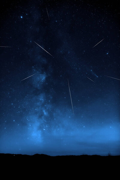 Milky Way stars and rural countryside silhouettes