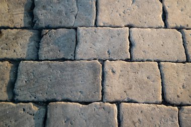 Close up of the sunny cobblestone road in the old town in Croatia.