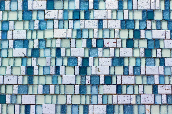 mosaic tiles background tile mosaic of small cubes of blocks of white and blue staggered chess uneven surface