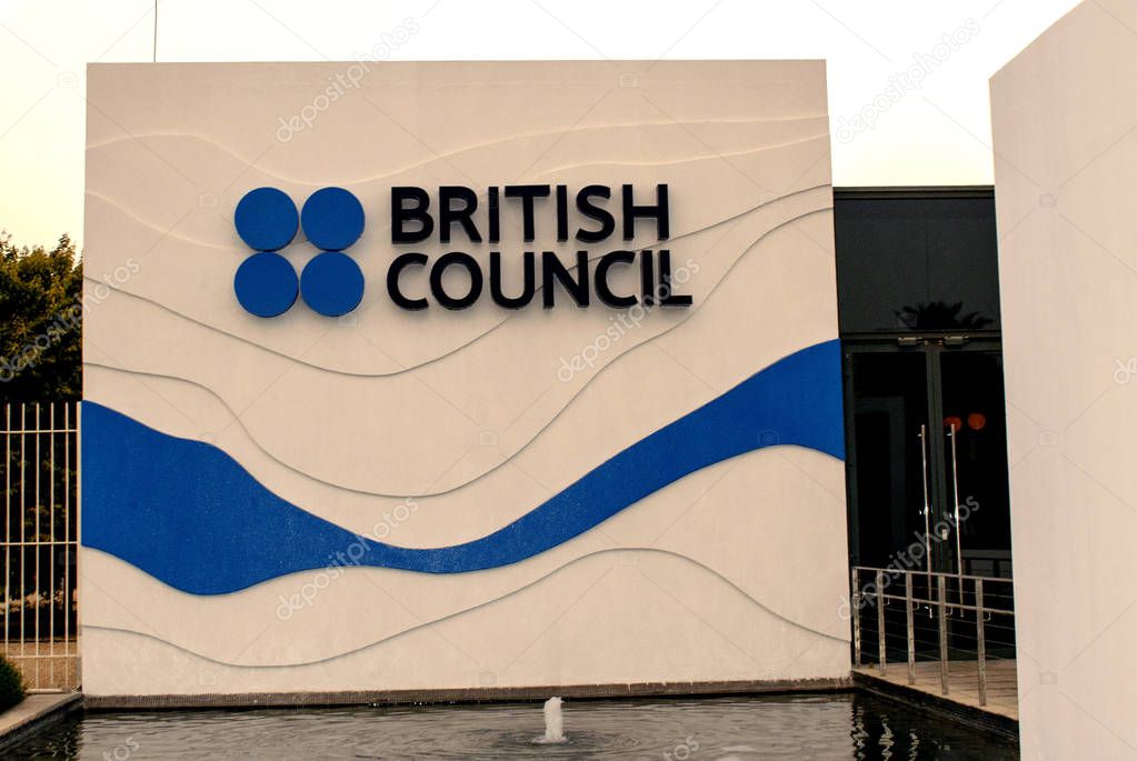 Dubai / United Arab Emirates - August 14, 2019: British Council logo on the building facade, blue in color. The UK international organisation for cultural relations and cultural opportunities.