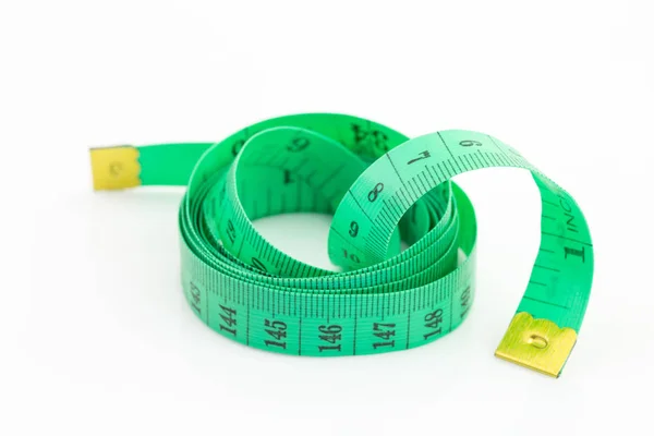 測定テープが白い背景で隔離の緑 ストック写真
