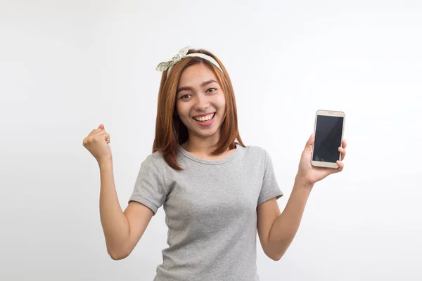 Gelukkige Jonge Vrouw Houdt Telefoon Een Witte Achtergrond — Stockfoto