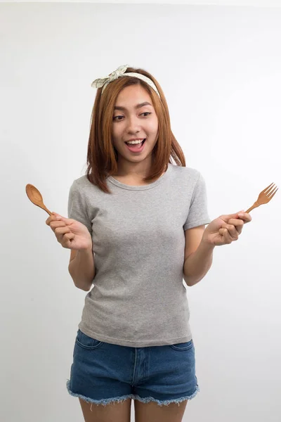 Aziatische Jonge Vrouw Houden Lepel Vork Een Witte Achtergrond — Stockfoto