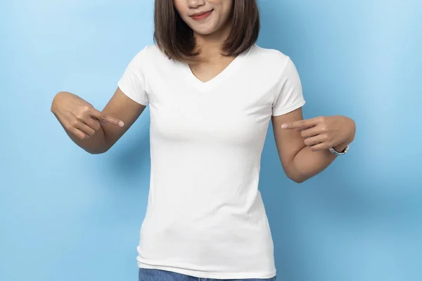 Portrait of asian woman in a blank white T-shirt on blue backgro — Stock Photo, Image