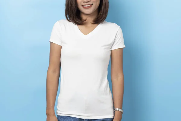 Portrait of asian woman in a blank white T-shirt on blue backgro — Stock Photo, Image