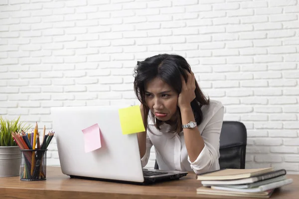 Desperate businesswoman worried in office — Stock Photo, Image