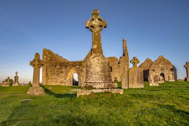 Clonmacnoise Monastery in Ireland countryside clipart