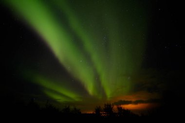 Colorful northern lights (Aurora Borealis), Iceland clipart